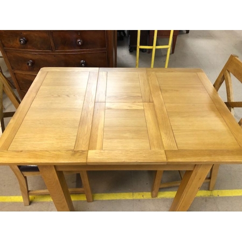 348 - Small modern extending dining / kitchen table and two chairs, table approx 113cm x 80cm fully extend... 