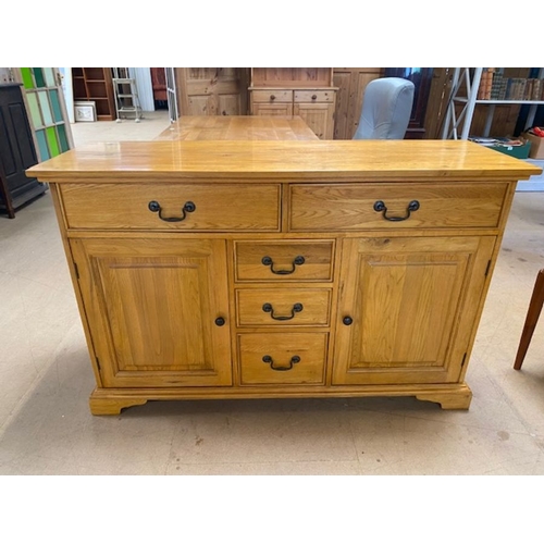 352 - Contemporary polished oak sideboard by 'Shire Oak', with five drawers and two cupboards, approx 137c... 