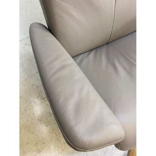 354 - Grey leather 'Stressless' reclining swivel armchair with matching footstool