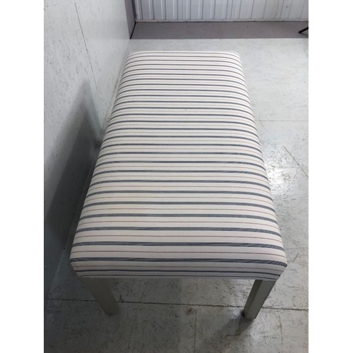 355 - Modern Ottoman seat, upholstered in ticking style fabric on painted legs approximately 120cm x 60cm ... 