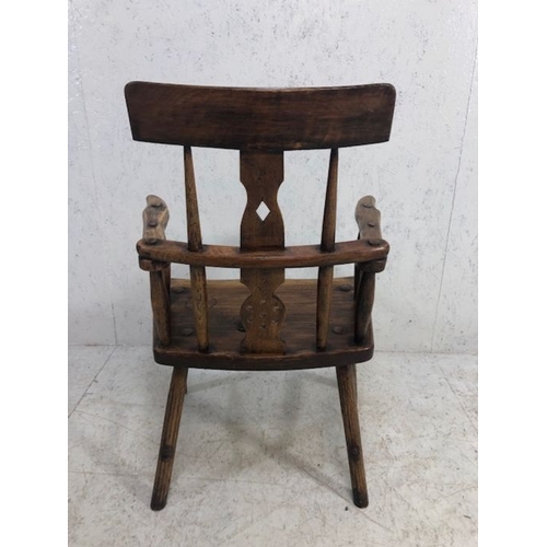 357 - Antique rustic armchair with turned stick back and pierced splat, possibly Irish