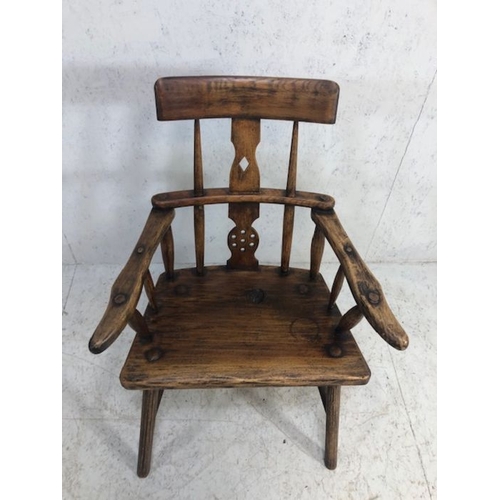 357 - Antique rustic armchair with turned stick back and pierced splat, possibly Irish