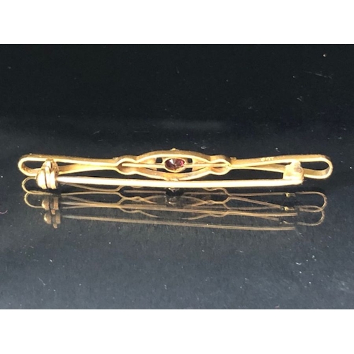 36 - 9ct Gold Garnet and seed pearl Brooch approx 5.5cm in length and 2.6g