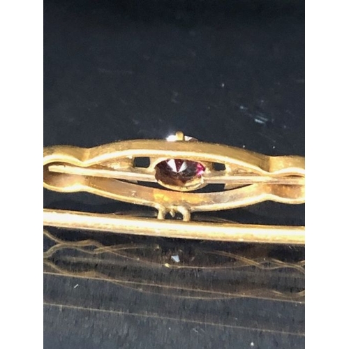 36 - 9ct Gold Garnet and seed pearl Brooch approx 5.5cm in length and 2.6g