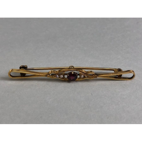 36 - 9ct Gold Garnet and seed pearl Brooch approx 5.5cm in length and 2.6g