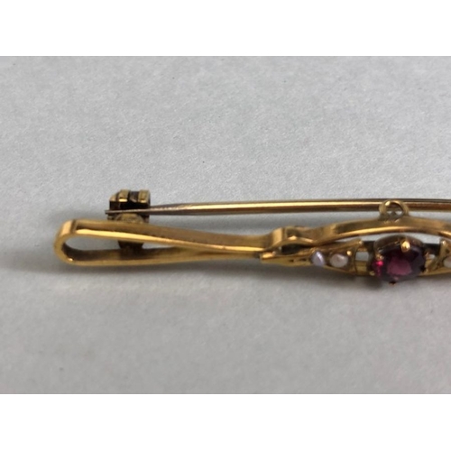 36 - 9ct Gold Garnet and seed pearl Brooch approx 5.5cm in length and 2.6g