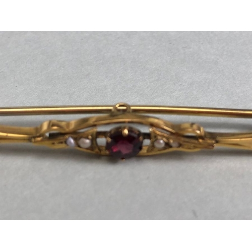 36 - 9ct Gold Garnet and seed pearl Brooch approx 5.5cm in length and 2.6g