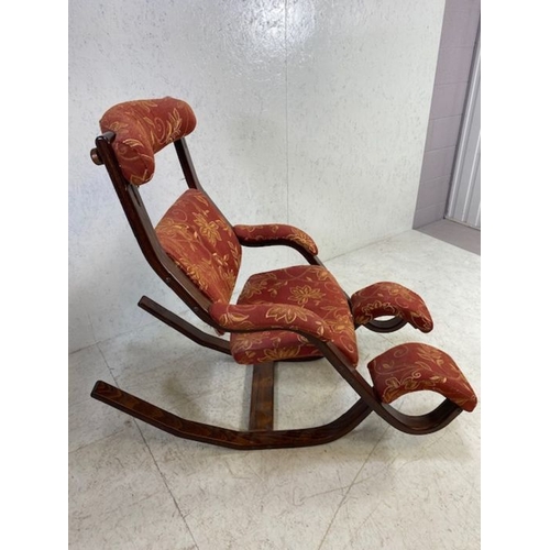 364 - Interesting upholstered rocking chair with foot rests and adjustable headrest