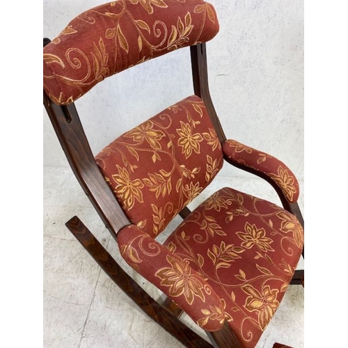 364 - Interesting upholstered rocking chair with foot rests and adjustable headrest