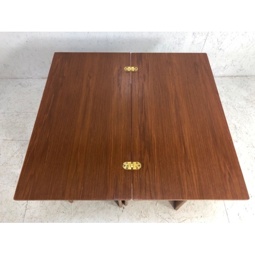 371 - Mid Century A.H. McIntosh & Co Ltd nest of three tables with twist hinged top opening to create occa... 