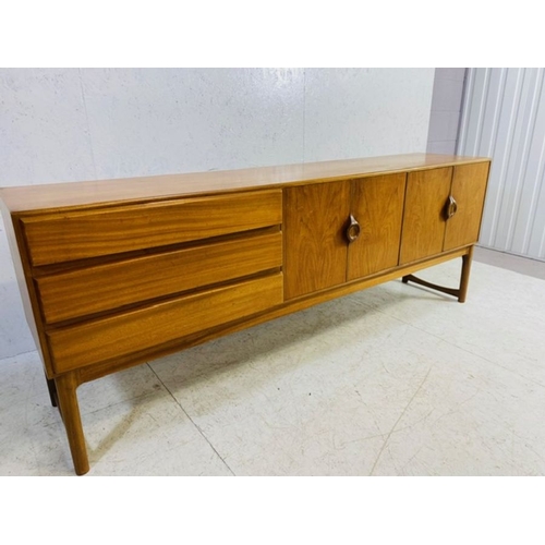 373 - Mid Century sideboard by A.H. McIntosh & Co Ltd with three drawers to the left hand side, including ... 