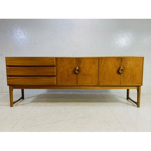 373 - Mid Century sideboard by A.H. McIntosh & Co Ltd with three drawers to the left hand side, including ... 