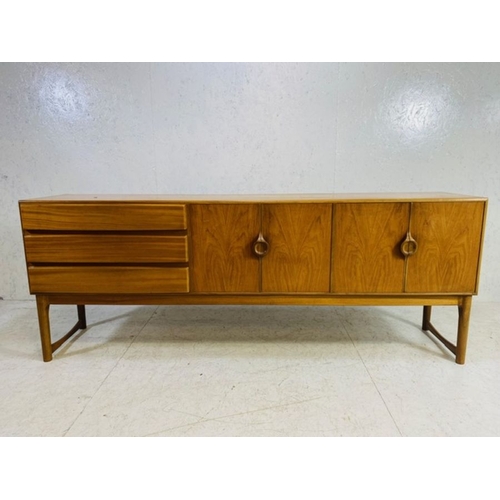 373 - Mid Century sideboard by A.H. McIntosh & Co Ltd with three drawers to the left hand side, including ... 