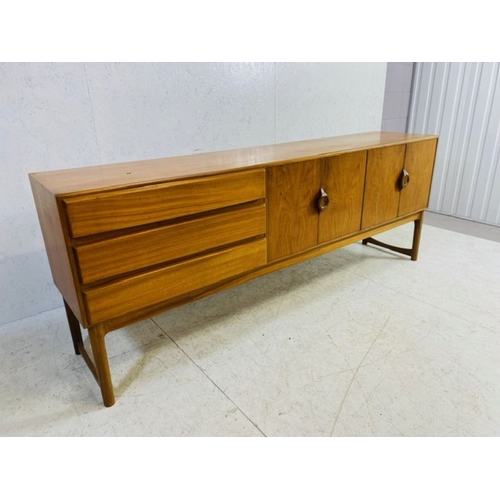 373 - Mid Century sideboard by A.H. McIntosh & Co Ltd with three drawers to the left hand side, including ... 