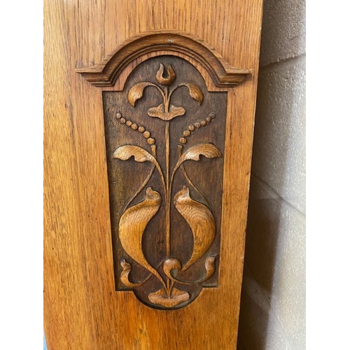 374 - Single wardrobe with door containing bevel edged mirror, carved art deco detailing and original key,... 