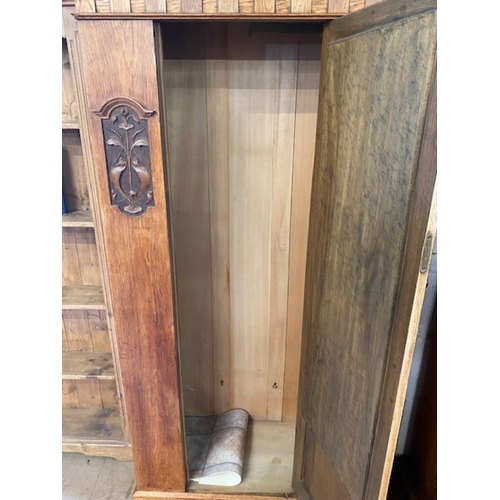 374 - Single wardrobe with door containing bevel edged mirror, carved art deco detailing and original key,... 