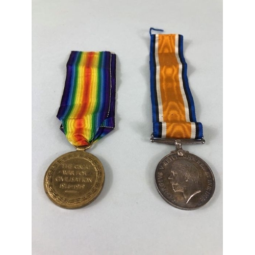 377 - Military interest, a pair of WW1 British medals  named to 69319 PTE. H.Butler,  29 London .R.