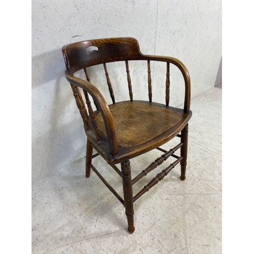 387 - Smokers or elbow chair with turned spindles and pierced seat