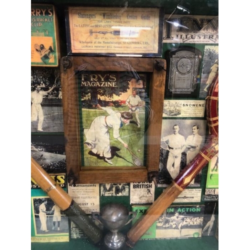 393 - Sporting memorabilia, Framed display of Lawn Tennis items, comprising of Rackets, Balls trophy's, ad... 