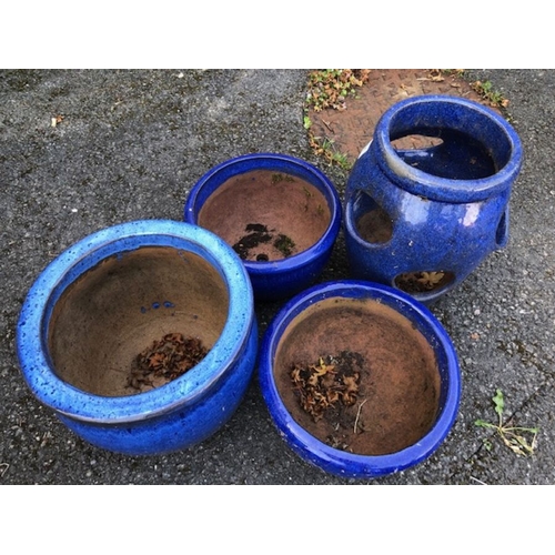 401 - Collection of four blue glazed garden pots