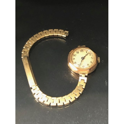 41 - 9ct Gold cased Octagonal cocktail watch (winds and runs) with gold coloured strap A/F