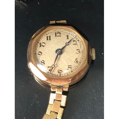 41 - 9ct Gold cased Octagonal cocktail watch (winds and runs) with gold coloured strap A/F