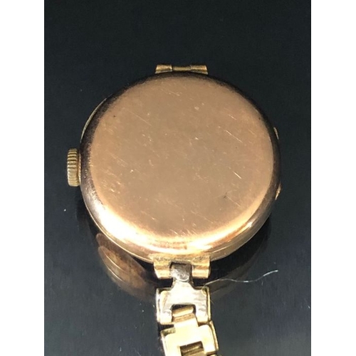 41 - 9ct Gold cased Octagonal cocktail watch (winds and runs) with gold coloured strap A/F