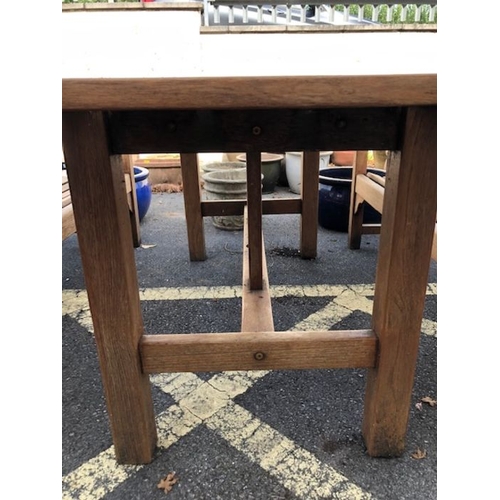 411 - Solid wood garden table and two benches, table approx 168 x 83 x 74cm