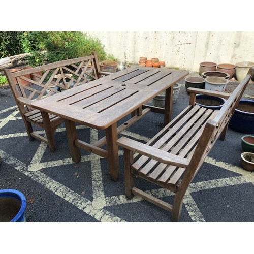 411 - Solid wood garden table and two benches, table approx 168 x 83 x 74cm