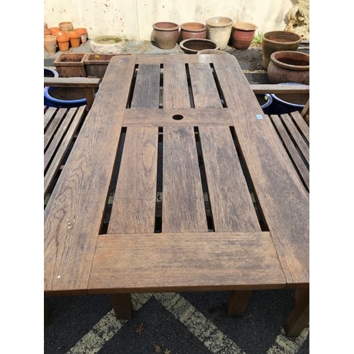 411 - Solid wood garden table and two benches, table approx 168 x 83 x 74cm