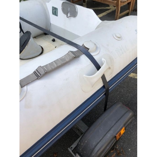 412 - Bombard Ridged Inflatable RIB boat model AX 5001 approx 10ft long on road trailer with winch and spa... 