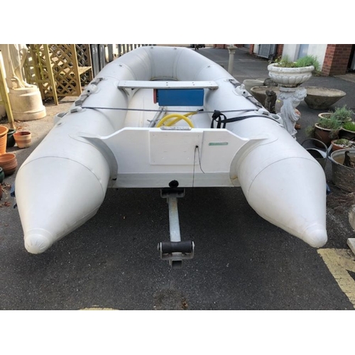 412 - Bombard Ridged Inflatable RIB boat model AX 5001 approx 10ft long on road trailer with winch and spa... 