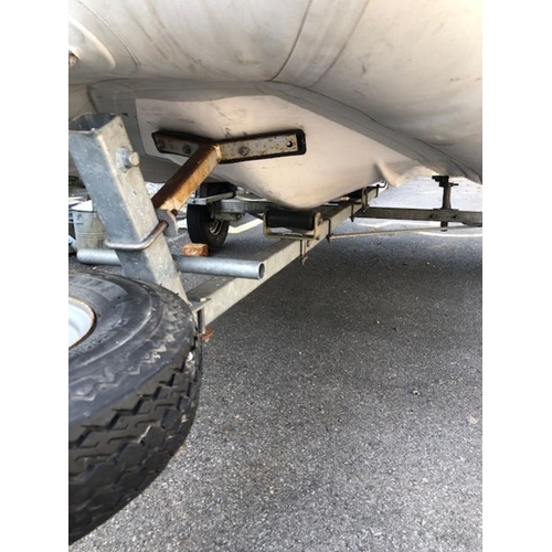 412 - Bombard Ridged Inflatable RIB boat model AX 5001 approx 10ft long on road trailer with winch and spa... 