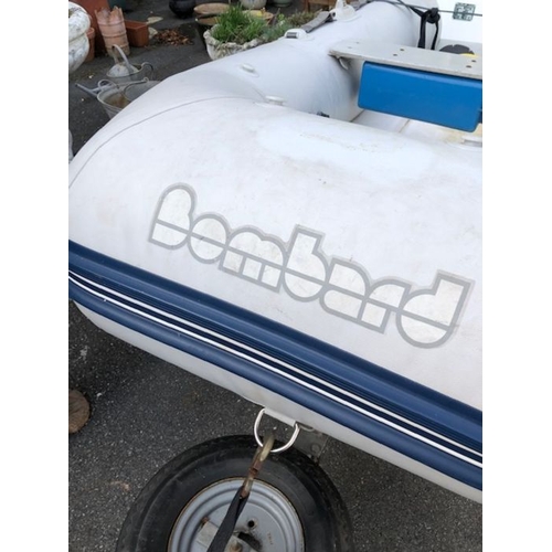 412 - Bombard Ridged Inflatable RIB boat model AX 5001 approx 10ft long on road trailer with winch and spa... 