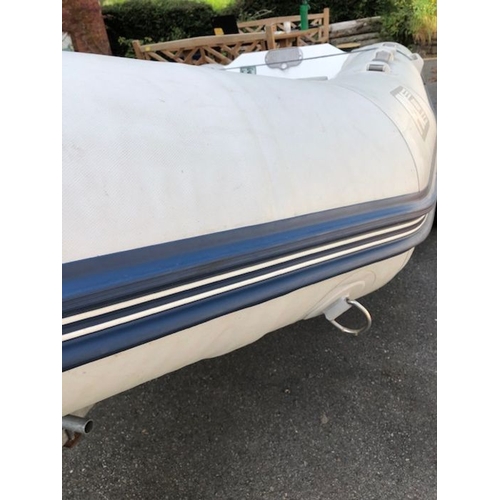 412 - Bombard Ridged Inflatable RIB boat model AX 5001 approx 10ft long on road trailer with winch and spa... 