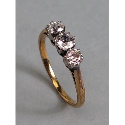 42 - Three stone Diamond ring on yellow Gold size approx K