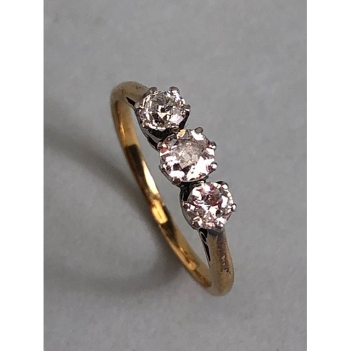 42 - Three stone Diamond ring on yellow Gold size approx K