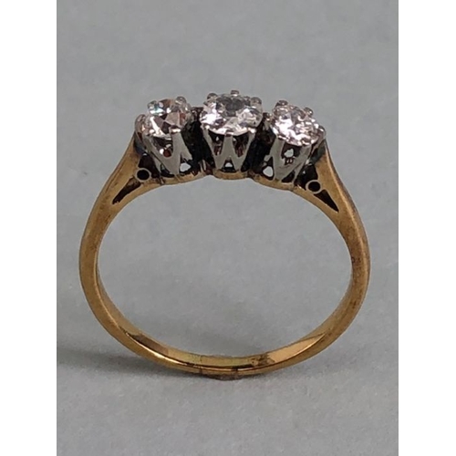 42 - Three stone Diamond ring on yellow Gold size approx K