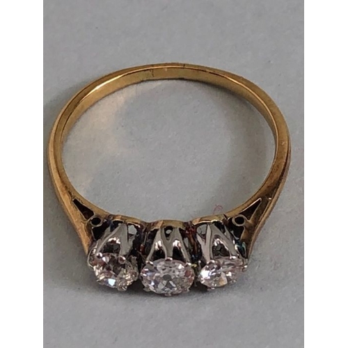 42 - Three stone Diamond ring on yellow Gold size approx K