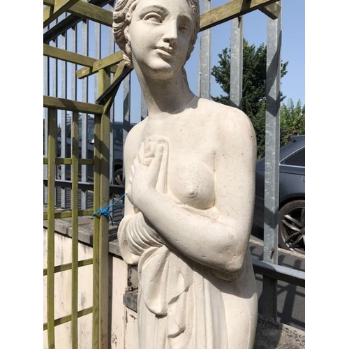 436 - Garden statue of a scantily clad maiden on a plinth approx 200cm tall made from plastic or resin wit... 