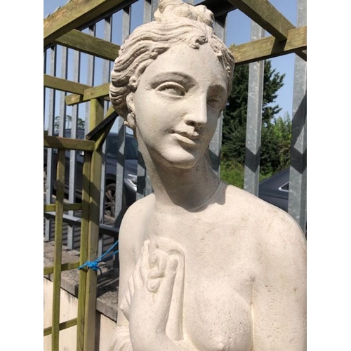 436 - Garden statue of a scantily clad maiden on a plinth approx 200cm tall made from plastic or resin wit... 