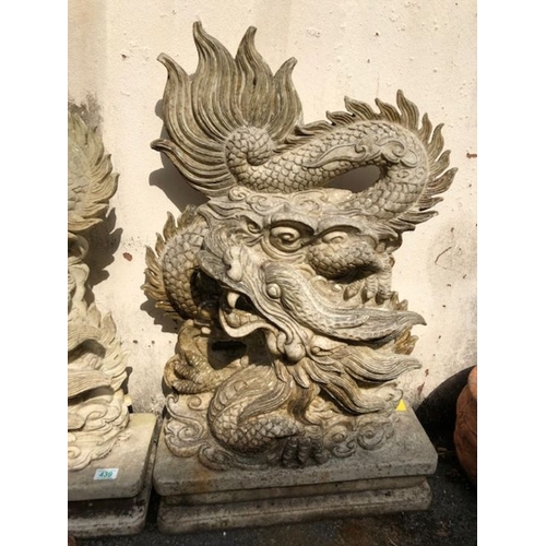 439 - Pair of Garden statues depicting Chinese dragons on Plinths made of resin approx 89 x 54cm