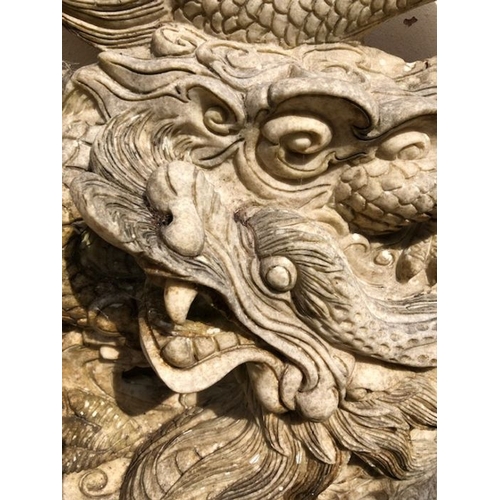 439 - Pair of Garden statues depicting Chinese dragons on Plinths made of resin approx 89 x 54cm