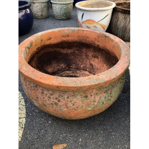 440 - Two large weathered garden Terracotta Garden planters/ pots largest 40cm tall