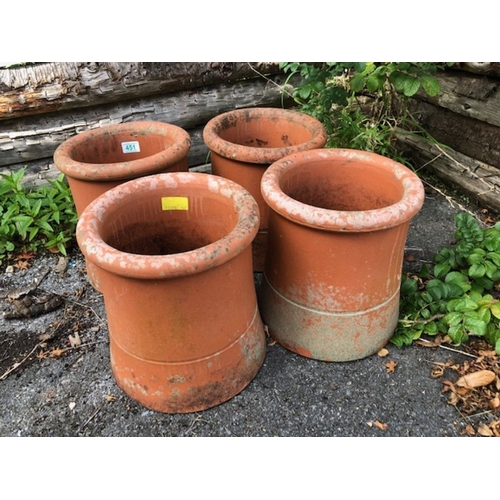 451 - Collection of four matching chimney pots each approx 30cm tall