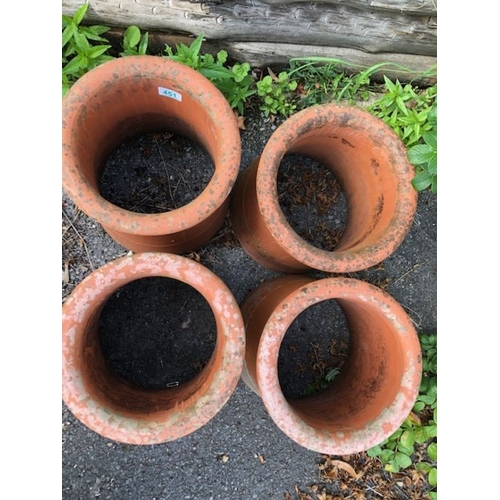 451 - Collection of four matching chimney pots each approx 30cm tall