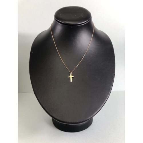 46 - 9ct Gold Cross on a fine necklace chain also 9ct and approx 40cm in length and 1.2g