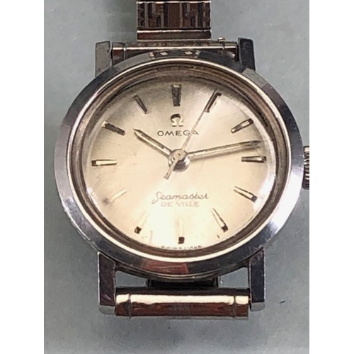 49 - Omega Seamaster De Ville Steel cased with silver Dial and Baton markers on expanding bracelet. Dial ... 