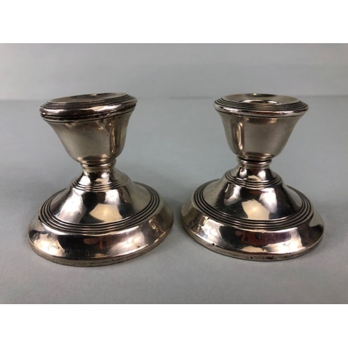 5 - Pair of snub circular Silver Birmingham hallmarked candlesticks approx 5cm in height