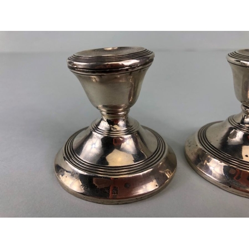 5 - Pair of snub circular Silver Birmingham hallmarked candlesticks approx 5cm in height